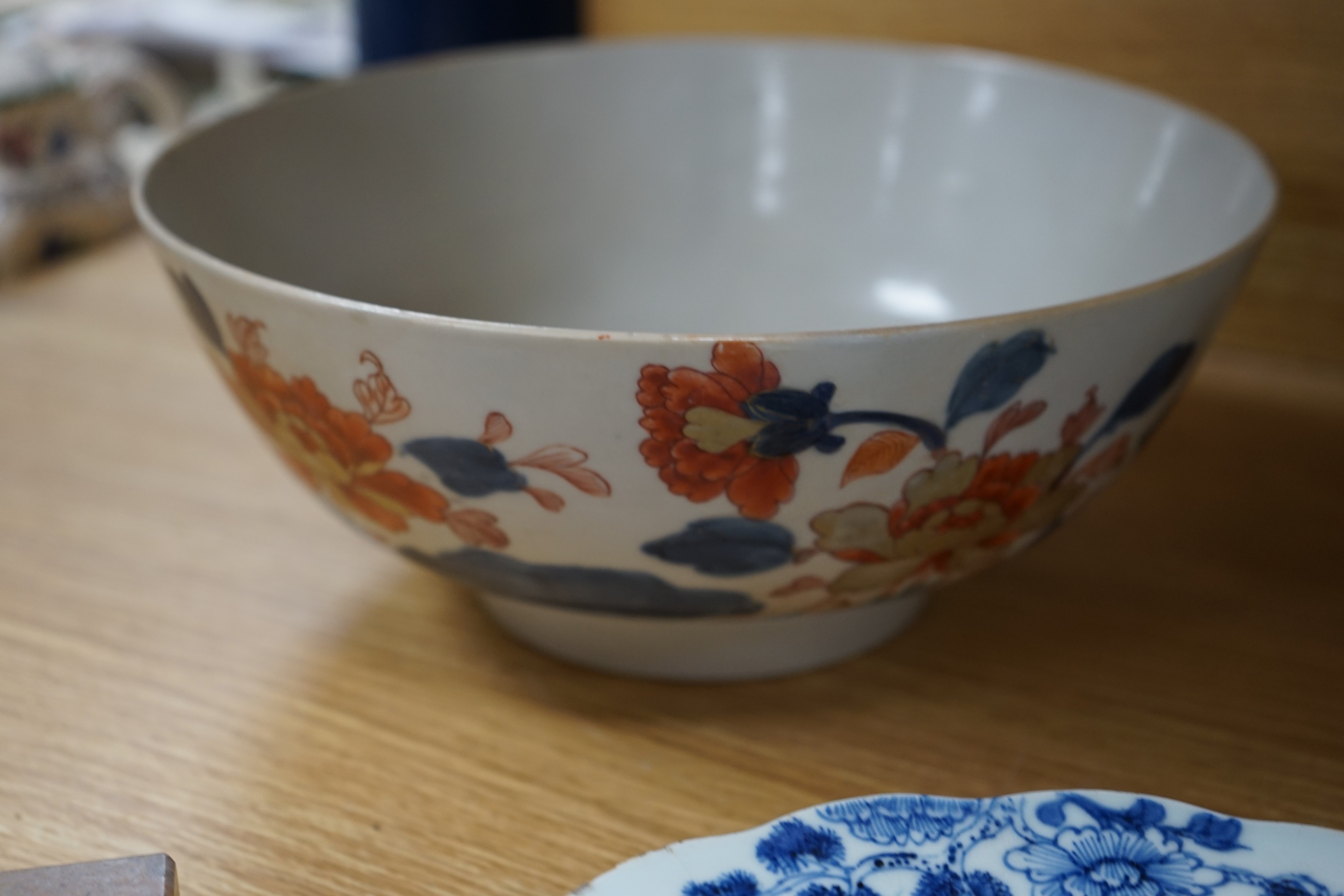 Three 18th century Chinese export porcelain bowls, largest 28 cm and two plates